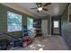 Versatile flex space with ample storage and natural light from multiple windows at 1650 Tomahawk Trl, Cumming, GA 30041