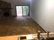Spacious living room featuring a stone fireplace and sliding glass doors to the backyard at 286 Toweridge Sw Dr # 3, Marietta, GA 30064
