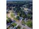 A birds eye view of a residential neighborhood with tree-lined streets at 421 Old Ivy Path, Mcdonough, GA 30253
