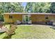 Enjoy the backyard with a patio seating area and a fire pit to create a cozy outdoor retreat at 5509 Covent Way, Lithonia, GA 30058
