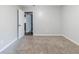 Empty bedroom features carpet, light grey walls and two doors at 5509 Covent Way, Lithonia, GA 30058
