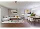 Open-concept living and dining areas with stylish furnishings and modern decor that create a welcoming atmosphere at 5509 Covent Way, Lithonia, GA 30058