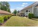 Spacious backyard with a patio and landscaped garden at 1972 Clovercroft Rd, Acworth, GA 30101