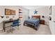 Nicely decorated bedroom with neutral walls, a desk, and sports-themed decor at 1972 Clovercroft Rd, Acworth, GA 30101