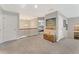 Spacious hallway with carpet and decor pieces at 1972 Clovercroft Rd, Acworth, GA 30101