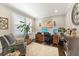 Comfortable home office with a large desk, plush chair, and plantation shutters at 1972 Clovercroft Rd, Acworth, GA 30101