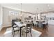 Bright kitchen features a spacious island, stainless appliances, white cabinets, and an eat-in dining space at 1972 Clovercroft Rd, Acworth, GA 30101