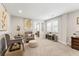 Cozy sitting area features plush chairs, an ottoman, and tasteful decor at 1972 Clovercroft Rd, Acworth, GA 30101