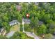 Expansive aerial view of the neighborhood showcasing lush greenery and mature trees surrounding the property at 341 Lands Se Ml, Marietta, GA 30067