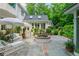 Backyard has a relaxing lounging area with a beautiful water feature at 341 Lands Se Ml, Marietta, GA 30067