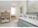 Bathroom offering marble countertops and painted cabinetry, with a charming vintage aesthetic at 341 Lands Se Ml, Marietta, GA 30067