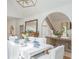 Bright dining room features white linens, hardwood floors, and natural light at 341 Lands Se Ml, Marietta, GA 30067