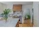 The kitchen has marble countertops and backsplash, stainless steel appliances, and a gorgeous hardwood floor at 341 Lands Se Ml, Marietta, GA 30067