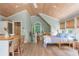 Living space featuring vaulted wood ceilings, modern furnishings, and an open floor plan at 341 Lands Se Ml, Marietta, GA 30067