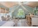 Open-concept living area featuring a vaulted ceiling, hardwood floors, and modern decor at 341 Lands Se Ml, Marietta, GA 30067
