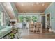 Open-concept living space with vaulted wood ceilings, modern appliances, and a breakfast bar at 341 Lands Se Ml, Marietta, GA 30067