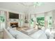 Bright living room with fireplace, large windows, and natural light at 341 Lands Se Ml, Marietta, GA 30067