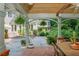 View of the landscaped backyard with a water feature from covered patio at 341 Lands Se Ml, Marietta, GA 30067