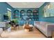 Blue sitting room featuring custom built-ins, a gray sofa and a live edge coffee table at 341 Lands Se Ml, Marietta, GA 30067