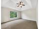 Spacious bedroom boasts carpeted floors, a ceiling fan, and ample natural light from the large window at 617 Kyles Cir, Hiram, GA 30141