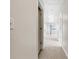 Bright hallway featuring neutral paint, carpet, and natural light at 617 Kyles Cir, Hiram, GA 30141