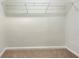 Spacious walk-in closet with wire shelving for efficient storage at 617 Kyles Cir, Hiram, GA 30141