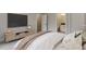 Inviting bedroom featuring neutral tones, TV, and access to a connected bathroom for added convenience at 7620 Breeze Bay Rd, Cumming, GA 30041