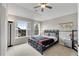 Cozy bedroom with a window view and modern decor at 2020 Windermere Xing, Cumming, GA 30041