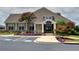 Community clubhouse featuring well-maintained landscaping and designated parking spots at 2020 Windermere Xing, Cumming, GA 30041