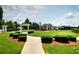 Well-manicured community grounds with walking path, pavilion, and tennis courts at 2020 Windermere Xing, Cumming, GA 30041