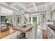 Elegant dining area with coffered ceilings, a chandelier, and lots of natural light at 2020 Windermere Xing, Cumming, GA 30041