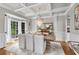 Elegant dining room featuring coffered ceilings, a chandelier, and bay windows, perfect for gatherings at 2020 Windermere Xing, Cumming, GA 30041
