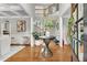 Bright foyer featuring hardwood floors, elegant staircase, and stylish decor, creating a welcoming entrance at 2020 Windermere Xing, Cumming, GA 30041