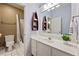 Bathroom featuring a white vanity, tiled floors, and neutral paint at 525 Watergate Ct, Roswell, GA 30076