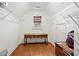 Walk-in closet with white wire shelving and table space for storage at 525 Watergate Ct, Roswell, GA 30076