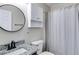 Bathroom featuring granite countertop vanity, modern fixtures, round mirror and linen closet at 159 Cranbrooke Dr, Dallas, GA 30157
