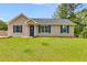Charming one-story home featuring a well-maintained lawn and classic curb appeal at 159 Cranbrooke Dr, Dallas, GA 30157