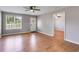 Bright living room featuring stylish wood floors and access to other rooms at 159 Cranbrooke Dr, Dallas, GA 30157