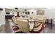 Basement features bar, pool table, comfortable seating, and wood-look floors at 2460 Due West Nw Cir, Kennesaw, GA 30152