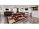 Basement game room with pool table, bar seating, and a tv at 2460 Due West Nw Cir, Kennesaw, GA 30152
