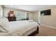 Bedroom with a TV, small table and chairs, and carpeted floor at 2460 Due West Nw Cir, Kennesaw, GA 30152