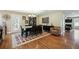 Formal dining room featuring a modern chandelier and hardwood floors at 2460 Due West Nw Cir, Kennesaw, GA 30152