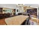 Open concept living and dining space with hardwood floors and lots of natural light at 2460 Due West Nw Cir, Kennesaw, GA 30152