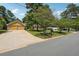 Charming one-story home with a well-manicured lawn and attached garage at 2460 Due West Nw Cir, Kennesaw, GA 30152