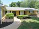 View of front exterior of home with a walkway at 2460 Due West Nw Cir, Kennesaw, GA 30152