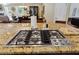 Close up of kitchen island with granite countertop and stainless steel gas cooktop and plenty of counter space at 2460 Due West Nw Cir, Kennesaw, GA 30152