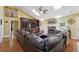 Bright living room featuring a vaulted ceiling, skylights, fireplace, and custom built-ins at 2460 Due West Nw Cir, Kennesaw, GA 30152