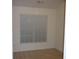 Neutral room featuring carpet and a window at 2502 Walden Lake Dr, Decatur, GA 30035