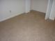 Bedroom features neutral carpet, a window, and white trim at 2502 Walden Lake Dr, Decatur, GA 30035