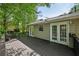 Spacious back deck perfect for outdoor dining and relaxing, featuring access to the backyard at 4035 Woodbridge Ct, Powder Springs, GA 30127
